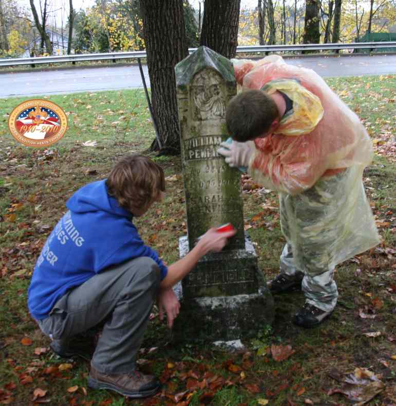 Scouts cleaning monument for William H. Penfield circa 2006.